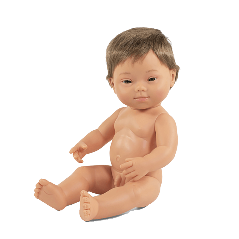Weiße Babypuppe mit Downsyndrom